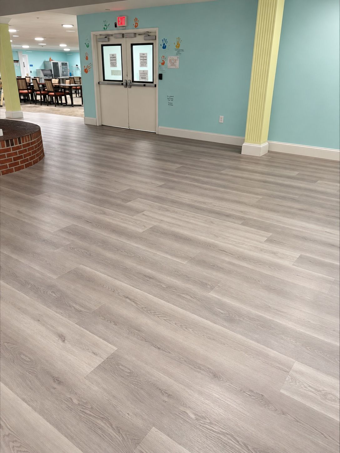 A hallway at Oak Grove Recovery in Westerville, Ohio, looking toward the dining room