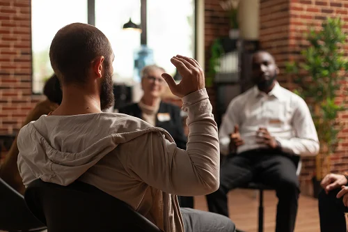 People talking about addiction resources