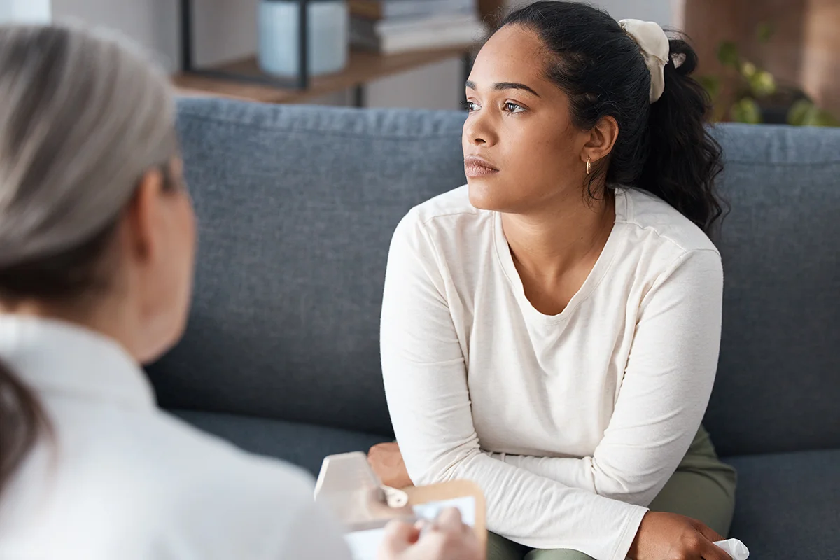 Two people talking about co-occurring disorders treatment