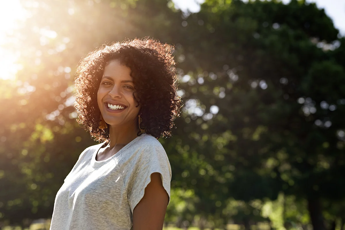 Person smiling and benefiting from medical detox