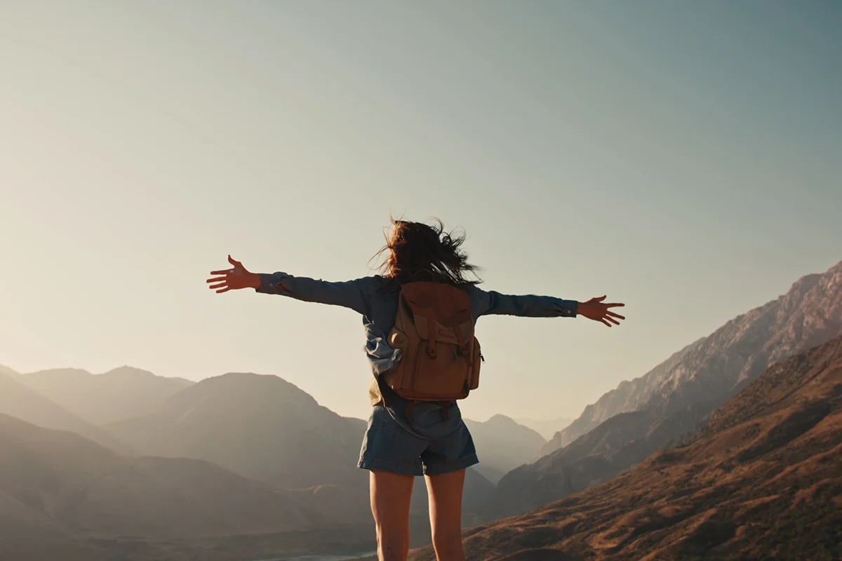 Person feeling free after paying for addiction treatment