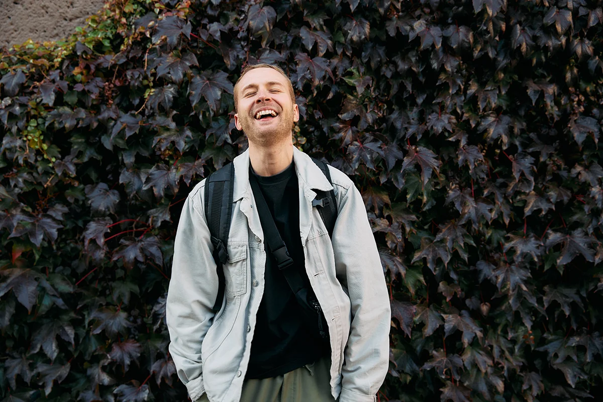 Person laughing and wondering what to expect in rehab