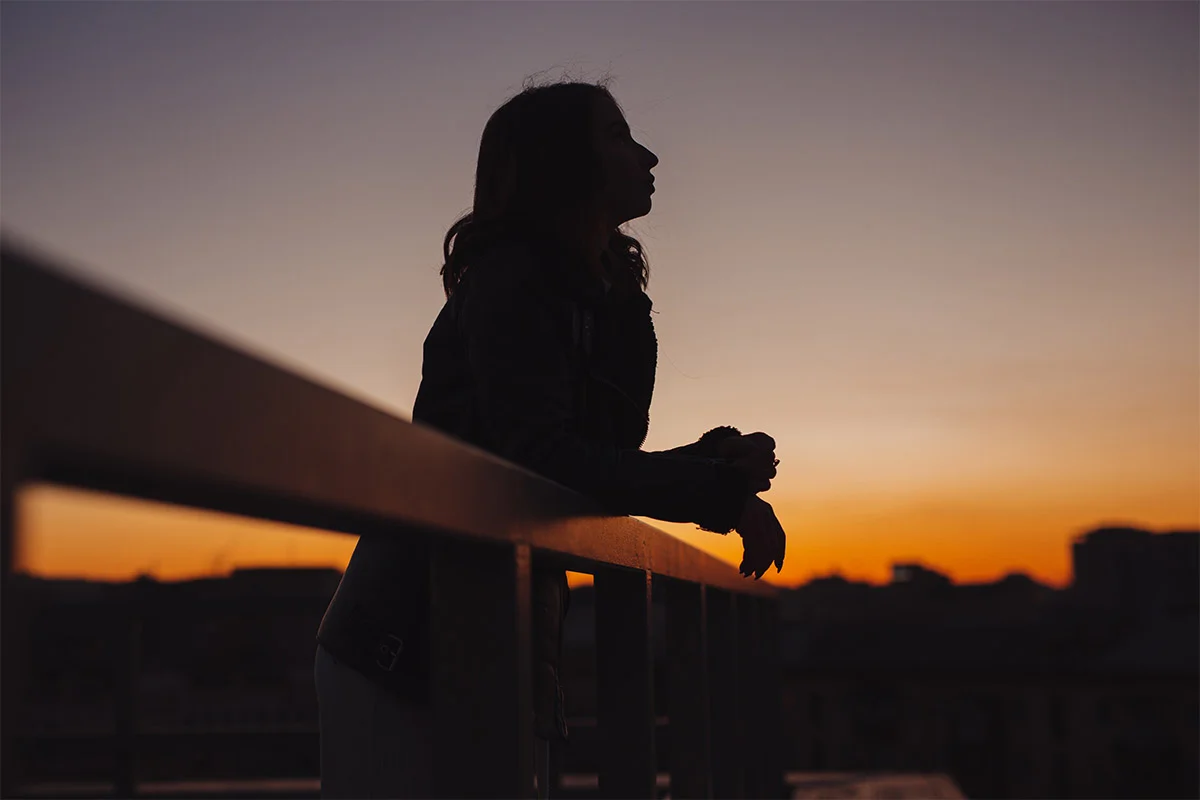 Woman at sunrise
